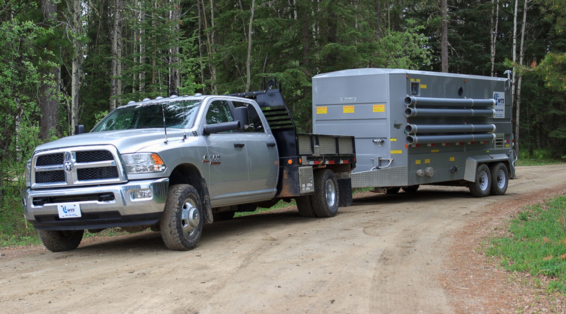 A pickup truck transporting a mobile accommodation unit A pickup truck transporting a mobile accommodation unit