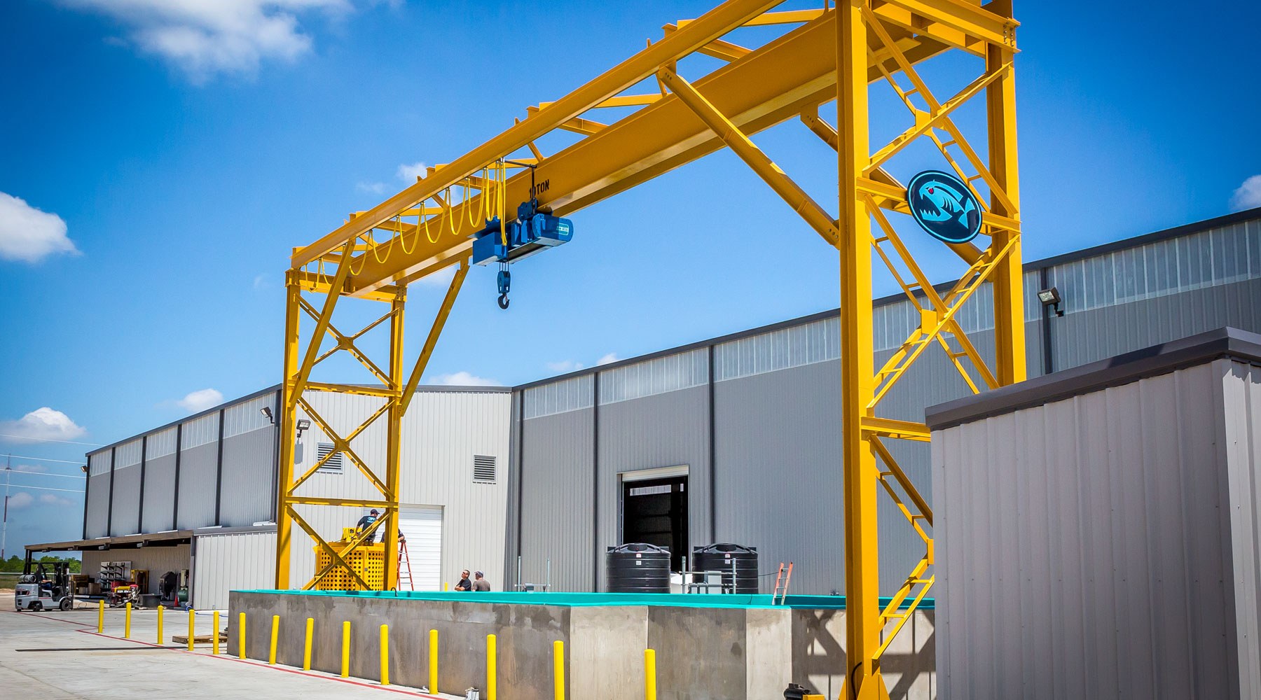 A winch and scaffolding above a subsea test tank A winch and scaffolding above a subsea test tank
