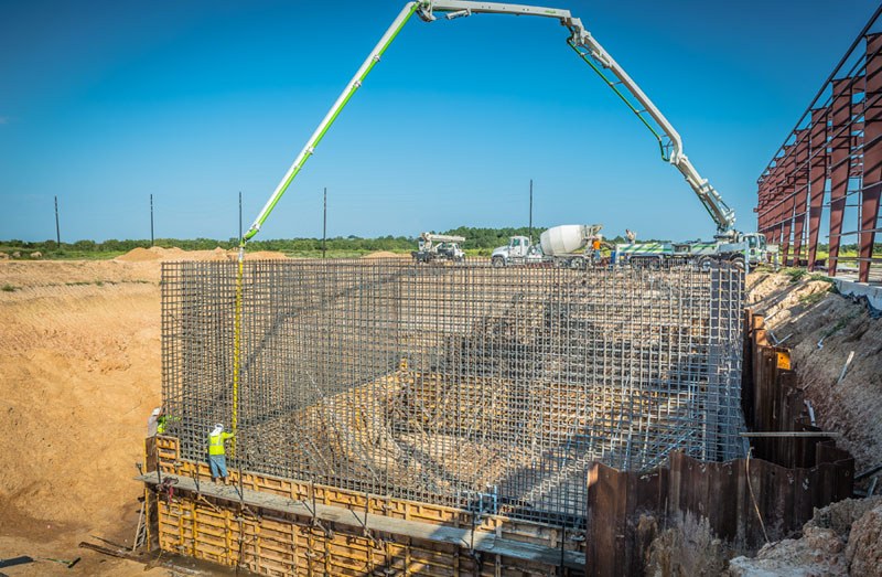 Image of a large square structure being built